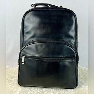 Rolling Backpack with shoulder straps.